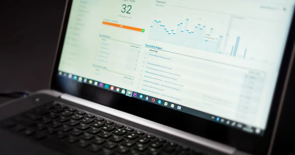 A laptop showing an analytics dashboard, the tracking behind brand visibility in AI search engines