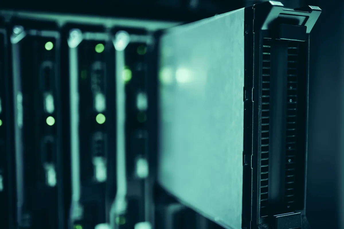 Server racks in a data centre, the hardware behind large language model training